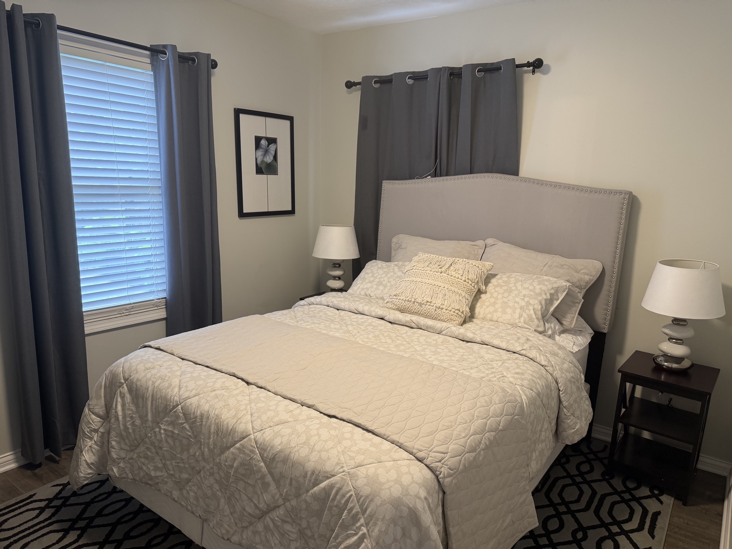 Guest bedroom with cream bedding
