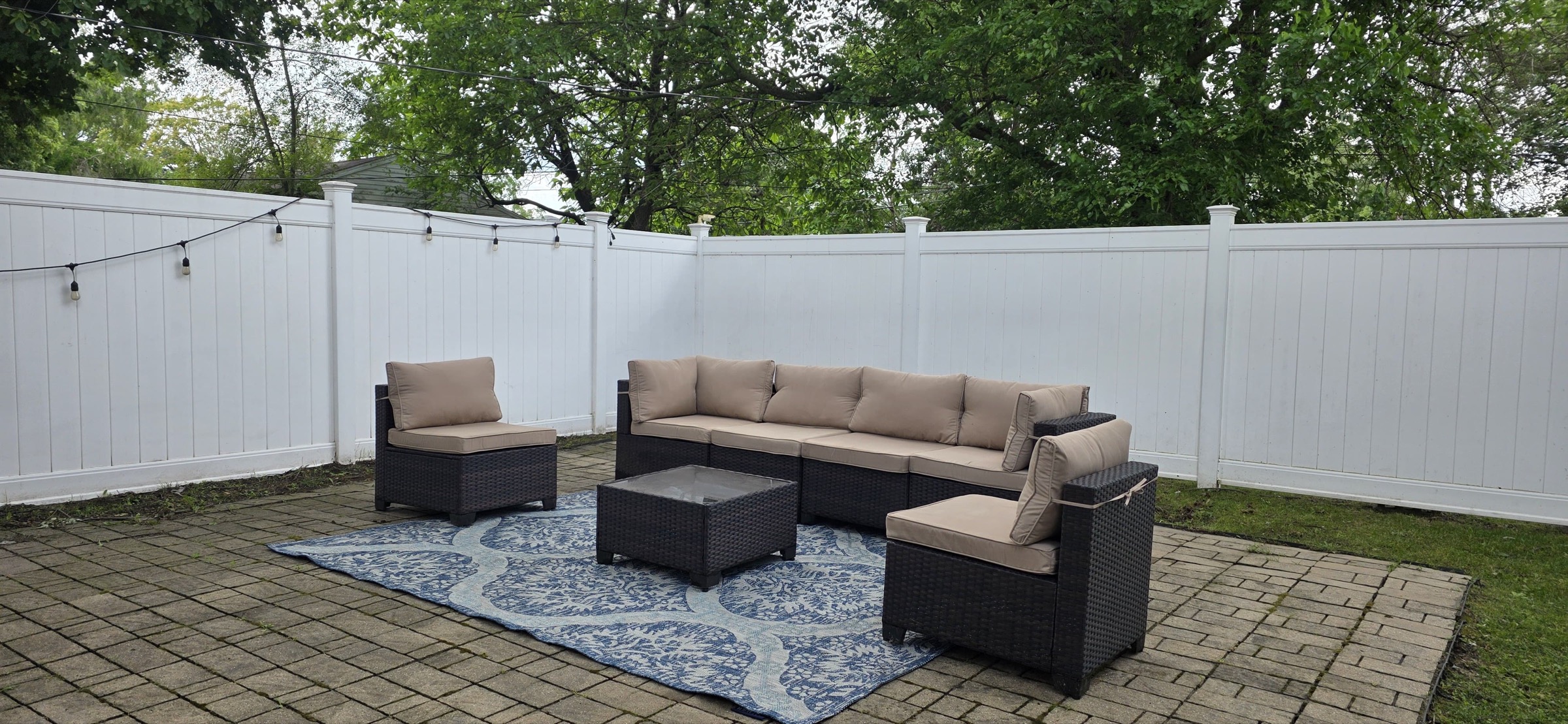 Outdoor seating on a fenced patio